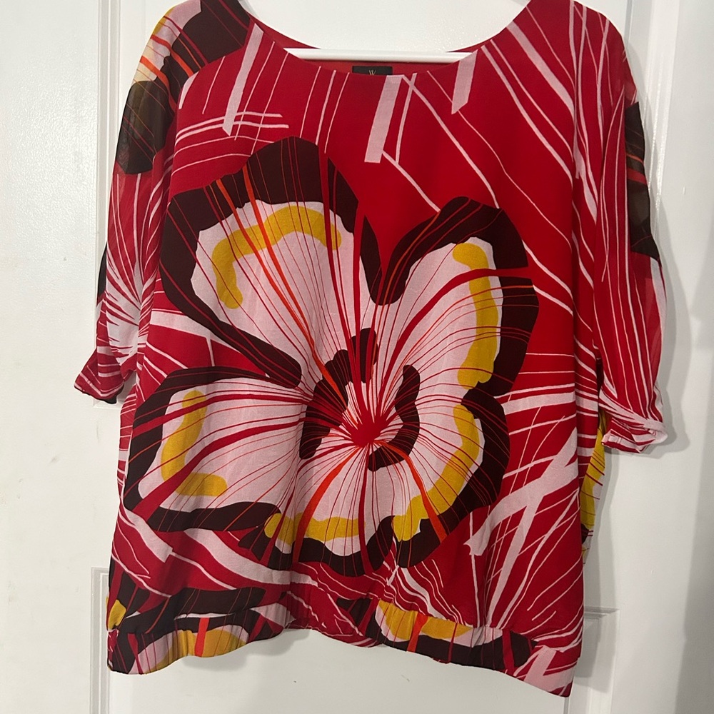 Red flowery dress shirt. I worn it to work and church.